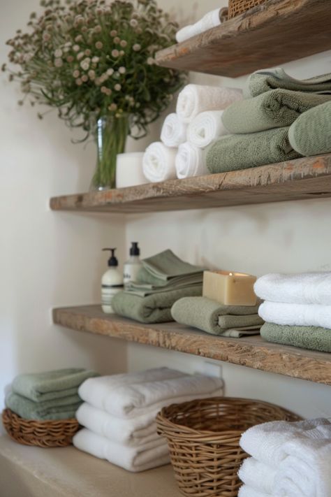 See how to create and style a stunning sage green bathroom with these tips. White Bathroom With Sage Green Accents, Boho Bathroom Sage Green, Spa Bathroom Ideas Master Bath Decor, Green And Tan Bathroom, Sage Green Bathrooms, Beige And Green Bathroom, Sage Green Bathroom Decor, Bathroom Spa Decor Ideas, Olive Green Bathrooms