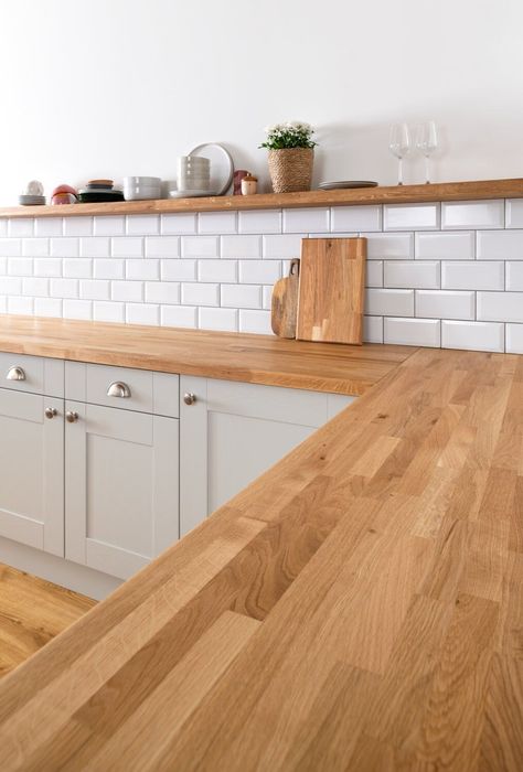 Our Solid Oak Kitchen Worktops will bring warmth to your kitchen! All of our Oak Worktops carry the natural beauty and diligence of the symbolic oak itself and are used either as Kitchen Worktops or as Table Tops. They are joined by Finger Joint mechanism, sanded and oiled with natural oil which showcases the beauty of the timber. Natural imperfections such as knots, grains and patterns are still present which add to the homey feeling of the Kitchen Worktops. Our oak worktops are made out of han Grey Kitchen Cupboards Wooden Worktop, Kitchen Light Wood Countertop, Oak And Taupe Kitchen, White Shaker Kitchen Wooden Worktop, Sage Kitchen Wooden Worktop, Grey Shaker Kitchen Wooden Worktop, Timber Top Kitchen, Oak And Gold Kitchen, Kitchen With Oak Worktop