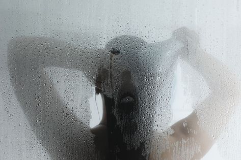 Silhouette of woman taking shower behind steamy door Scary Mommy, Cold Shower, Sleep Help, Steam Showers, Tankless Water Heater, The Verge, Stay At Home Mom, Before Bed, Post Workout