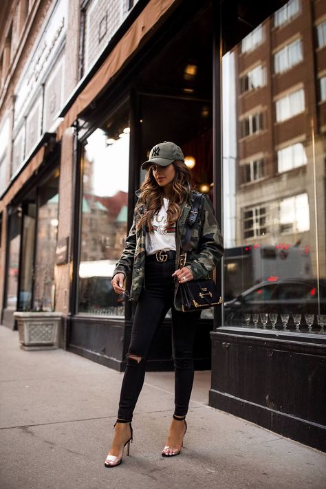 fashion blogger mia mia mine wearing a camo jacket and a gucci belt with manolo blahnik heels. #fashionblogger #womensfashion #style #casualootd Baseball Cap Outfit Summer, Mia Mia Mine, Baseball Cap Outfit, Walking In Heels, Mia Mia, Cap Outfit, Fall Transition Outfits, Denim Wear, Transition Outfits