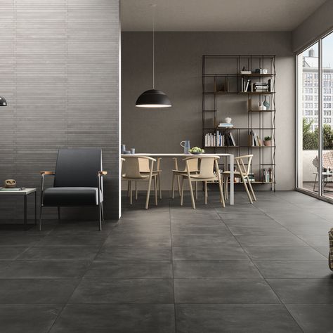 Basic Concrete porcelain tile series enhances the look of interior walls and floor due to its charming patterns inspired by the natural colors of concrete recreated in shades of grey, dark grey and black. This lively and versatile collection in sizes of 600×600 and 295x595mm is perfect for decorating lofts, open spaces, bedrooms, and luxurious bathrooms.    Note: Actual product colour may vary to the displayed image.      Product Information     Material:  Porcelain    Design: Concrete Dark Grey Tiles Living Room, Concrete Porcelain Tile, Grey Tiles Living Room, Hallway Tiles Floor, Dark Grey Tile, Tiles Living Room, Cheap Tiles, Tiled Hallway, Tile Covers