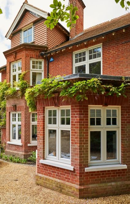 Timber casement windows restore Edwardian style to this family home 1930 Windows, Red Brick Victorian House, House Windows Exterior, Edwardian Windows, Edwardian House Exterior, 1930s House Exterior, Brick House Exterior, Red Brick House Exterior, Window Exterior