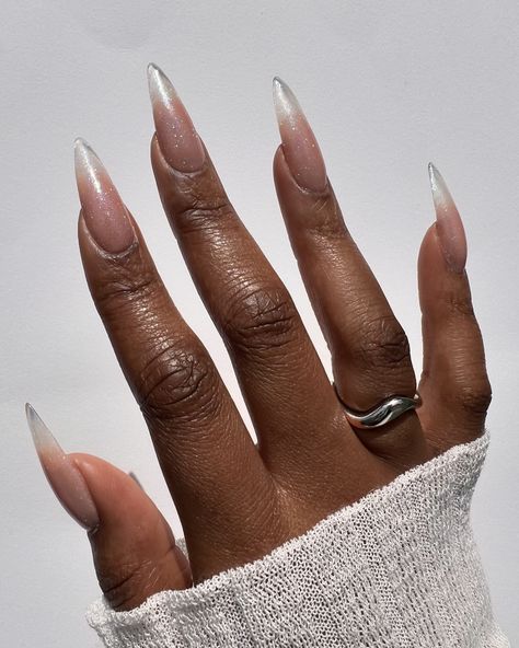 Stills of that glitter set 🤩✨ Created using @lovelecente Show Stopper Loose Glitter and Top Coat on @apresnailofficial Natural Stiletto Long Tips and @dndgel.europe Glass Peach gel #bygabrielleeva #nailinspo #nailart #nailinspo #longnails #bridalnails #glitternails #ombrenails #clearnails #gelxnails Clear Stiletto Nails Design, Clear Glitter Acrylic Nails, Elegant Stiletto Nails, Sharp Almond Nails, Short Pointy Nails, Medium Stiletto Nails, Natural Stiletto Nails, Gel Nails Glitter, Europe Nails