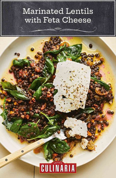 Love lentils? Us, too. Even if you don't, give this recipe a whirl. The combination of lentils with a spiced nut vinaigrette, fresh basil, and slabs of feta cheese may change your mind. #lentils #fetacheese #vegetarianmeals @mollybaz Marinated Lentils, Green Lentil Salad, Molly Baz, Spiced Walnuts, Veggie Side Dish Recipes, French Green Lentils, Feta Cheese Salad, Green Lentils, Lentil Salad