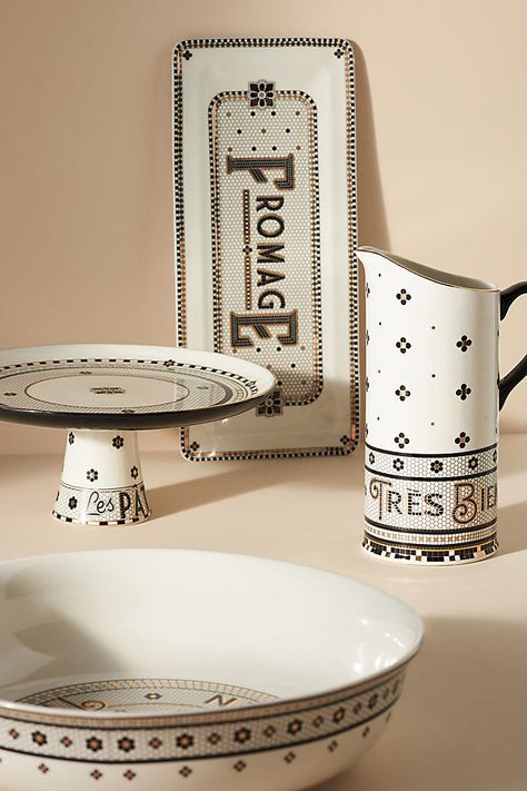 Discover the entire Top-Rated Bistro Tile Collection by AnthroLiving. Say au revoir to everyone-has-it dinnerware & décor – and bonjour (or bon appetit! ) to bold, bestselling, mosaic-inspired motifs, phrases en français, and a hint of glimmer with 24k gold decals. Drawing inspiration from the many sidewalk cafes that dot Parisian boulevards, each talk-worthy table topper and beautiful bathroom accent makes the perfect statement for the Francophile at heart (or a cherishable hostess gift!). Comp Bistro Tile Anthropologie, Anthropologie Bistro Collection, French Bistro Aesthetic, French Bistro Kitchen Decor, Bistro Signage, Dark Kitchen Decor, Bistro Aesthetic, Aesthetic Kitchenware, Bistro Kitchen Decor