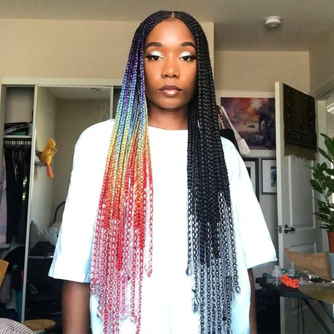 Fun with colors 😍 Do you love the funky twist that @cherdericka created with these box braids? 🌈 Which half of the style is your favorite? Melanin Hairstyles, Colorful Braids, Ombre Box Braids, Triangle Braids, Braids With Shaved Sides, Braid Accessories, Pretty Braids, Blonde Box Braids, Bold Hair Color