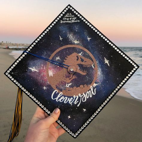 My Jurassic Park Galaxy grad cap😍 Instagram: @summerraelettering Galaxy Graduation Cap, Cap Instagram, Graduation Picture, Grad Caps, Graduation Picture Poses, Cap Ideas, Preschool Graduation, Park Designs, Graduation Diy