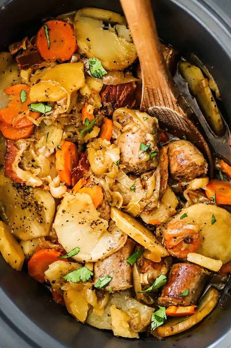 Dublin Coddle in a slow cooker with a wooden spoon stuck in the side. Irish Crockpot Recipes, Irish Coddle Recipe, Irish Coddle, Dublin Coddle Recipe, Coddle Recipe, Dublin Coddle, Irish Foods, Slow Cooker Ideas, Irish Dishes