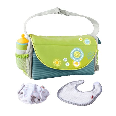 Here's everything your child needs when their doll needs a diaper change. This lightweight diaper bag folds out to become a changing mat. A clip-together shoulder strap makes it easy to carry, and the baby bottle fits in the side mesh pocket. Compatible with any HABA 10-12" doll. Simple to unfold and pack away again. I Summer Meadow, Newborn Baby Dolls, Realistic Dolls, Bag Summer, Changing Mat, Changing Bag, Baby Bottle, Doll Play, Sweet Summer