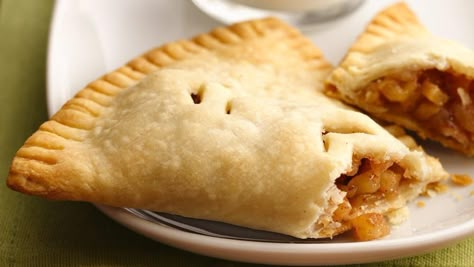 Apple pie you can pick up with your fingers!  These fold-over-style pockets drew attention at a state fair pie contest and are delicious warm or cool. Apple Pockets, Apple Pie Pockets, Pie Pockets, Pillsbury Pie Crust, Pillsbury Recipes, Mini Apple Pies, Apple Harvest, Fries In The Oven, Apple Desserts