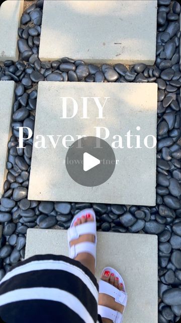 Stephanie Boyer | Interior Decor | Interior Design | DIY on Instagram: "The patio is coming along! I partnered with @loweshomeimprovement to transform my boring backyard. Comment links for a list of all the products I used to build the patio! Stay tuned to see the nexts steps✨✨

The pavers are linked in my bio #affiliatelink #lowespartner #lowesfinds #diy #patio #diyprojects #diypatio #pavers #paverstone #lowes #outdoorproject #patiodesign" Loose Stone Patio Ideas, Cheap Concrete Patio Ideas, Diy Pavers Over Concrete Patio, Rectangle Pavers Walkways, Concrete Block Patio Ideas, Rock And Paver Patio Ideas, Paint Pavers Patio, Cement Patio Ideas Diy, Paver Walkway With Grass In Between