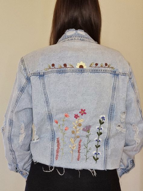 Cropped denim jacket with hand embroidered flowers on the back. Colorful flowers of all kinds covering the whole back. All embroidery was done by me, whole pattern hand embroidery. One of a kind! Tag size: M (medium) Fits: classic jacket, fits small, medium and large, depending on how you like it Measures: Shoulders 48cm, Length 52cm, Sleeve Length 57cm, Chest 54cm Condition: New jacket, Hand embroidery Visit my instagram page: @unikatic Denim Jacket Embroidery, Levi Denim Jacket, Repurposed Denim, Denim Embroidery, Embroidered Denim Jacket, Embroidery Shoes, White Denim Jacket, Classic Jacket, Embellished Jeans