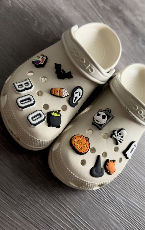 Crocs, crocs jibbitz, spooky crocs, spooky season, spooky things, Halloween, Halloween crocs, crocs gang, shoes, pumpkin, ghosts, thriller, scream, hocus pocus, fall Crocks Shoes Design, Cream Crocs With Jibbitz, White Crocs Charms Ideas, Crocs Ideas White, Crocs Gibbets Ideas, Off White Crocs, Bone Crocs Jibbitz, Best Crocs Color, Croc Theme Ideas