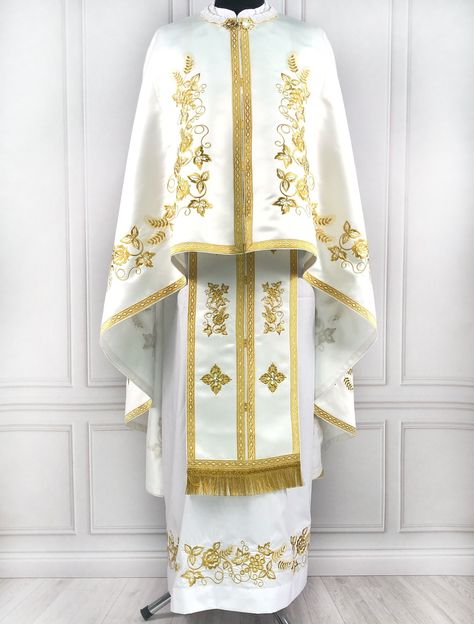 Please note that the complete vestments are made to order by hand. It takes us 2-3 months to make and embroider.  Discover a range of elegant church clothes and religious garments including cassock robes, priest sets, and deacon's vestments. Perfect for traditional Catholic and Greek style services. The set consists of: - Phelon,  - Epitracheal, - Armbands, - Belt, - Coverings 3 pcs, - Stichar. Length is 131 cm / 51.57 in - by default, but we will sew the vestments according to your individual m Church Robes, Priestly Garments, Catholic Clothing, Priest Outfit, Priest Robes, Orthodox Priest, Orthodox Catholic, Golden Embroidery, Church Attire