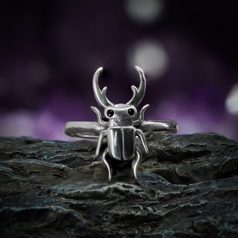 I find the stag Beetle to be a beautiful and fascinating creature. I designed this ring as I think they don't get nearly enough credit for being cute insect of the year (in my books anyway).This ring is designed to bring an interesting and unique look for both every day and getting dressed up. Cast with sterling silver on an adjustable band Adjustable to fit most sizes. Moth Ring, Witchy Ring, Beetle Ring, Bug Ring, Up Cast, Insect Ring, Unique Creatures, Witch Rings, The Stag