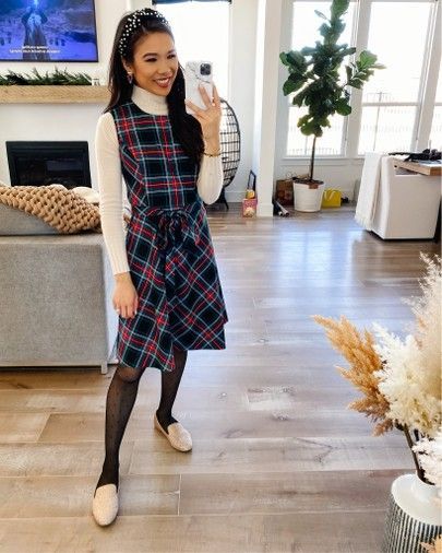 Plaid dress for holiday outfits layered with polka dot tights and a cashmere sweater. Also wearing a Pearl headband and Kendra Scott earrings. Dress is on sale for $88 and wearing size XS! @liketoknow.it #liketkit http://liketk.it/34zKt#LTKstyletip #LTKsalealert #LTKunder100 Polka Dot Tights, Prep Style, Circle Dress, Kendra Scott Earrings, Layering Outfits, Pearl Headband, Plaid Dress, Cashmere Sweater, Holiday Dresses