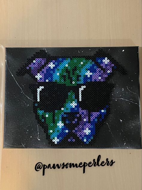 Galaxy colored pitbull on spray painted canvas. Light blue beads glow in the dark. Head design not created by me #pitbull #pitbullperler #pitbullart #pawsomeperlers #perler #perlerbeads Pitbull Perler Bead Patterns, Perler Pattern, Pony Bead Projects, Perler Ideas, Easy Perler Beads Ideas, Mini Iron, Perler Art, Hama Beads Design, Diy Perler Bead Crafts