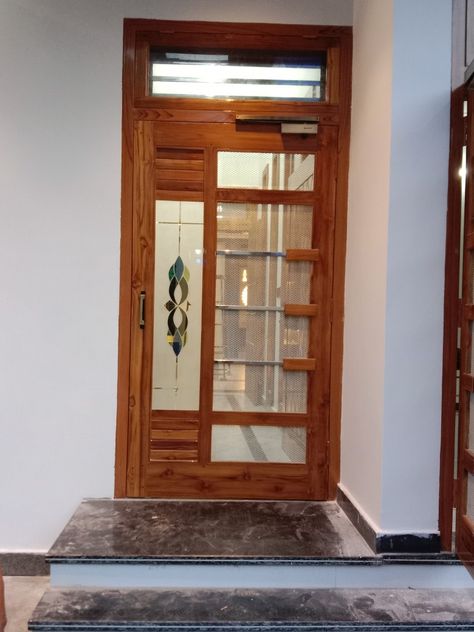 Wooden Main Door Design Jali, Latest Jali Door Design, Main Door Design Photos Latest, Outer Door Design, Jali Door Design Modern Interior, Wooden Jali Door Design Modern, Front Jali Door Design, Jali Door Design Modern, Jali Door Design