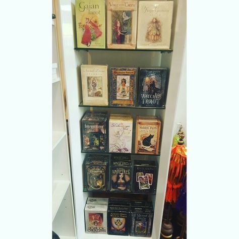 Tarot cards new in store.  $45-60. #thelivingearthco Tarot Card, Display Case, Tarot Cards, Magazine Rack, Gallery Wall, In Store, Holiday Decor, Wall, Furniture