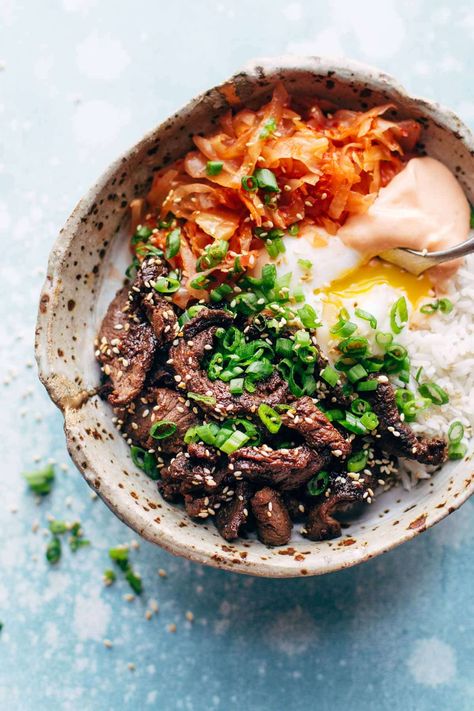 Korean BBQ Yum Yum Rice Bowls: easy marinated steak, spicy kimchi, poached egg, rice, and yum yum sauce! SO good and so easy! #easyrecipe #dinner #simpledinner #healthy #yum | pinchofyum.com Lunch Bowl Recipe, Spicy Kimchi, Egg Rice, Yum Sauce, Cooking Bowl, Yum Yum Sauce, 10 Dinner, Lunch Bowl, Marinated Steak