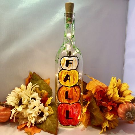 Fall Painted Bottles, Fall Wine Bottle Painting Ideas, Wine Bottle Fall Crafts, Fall Painted Wine Bottles, Fall Wine Bottle Crafts, Wine Diy Crafts, Wine Bottle Fairy Lights, Repurposed Bottles, Decorating Bottles