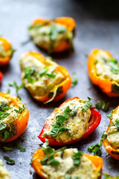 Pesto Stuffed Sweet Pepper Poppers - Stuffed with a super flavorful creamy pesto filling, these pesto stuffed sweet pepper poppers are SUPER addicting and the perfect little party app! Sweet Pepper Poppers, Pepper Poppers, Fall Party Food, Party Snacks Easy, Mini Sweet Peppers, Stuffed Mini Peppers, Sweet Pepper, Creamy Pesto, Easy Party Food