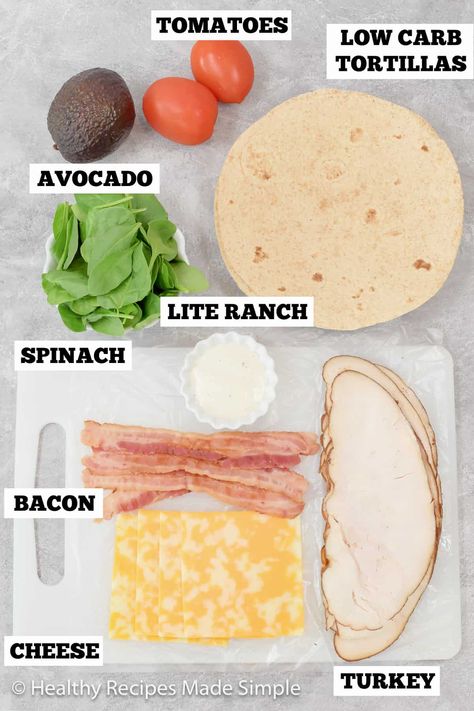 Let's get creative with lunchtime—try this totally delicious, low-carb turkey wrap! Packed with bacon, avocado and tomato, this easy-to-make meal adds flavor to your day. Don't let the taste fool you—this wrap is definitely low in carbs! Lunch Wrap Meal Prep, Healthy Eating Sandwiches, Lettuce Wrap Turkey Sandwich, Healthy Sandwich Wraps Lunch Ideas, How To Make A Turkey Wrap, Easy Turkey Wraps For Lunch, Turkey And Avocado Wrap, Low Carb Turkey Wraps, Turkey Bacon Avocado Wrap