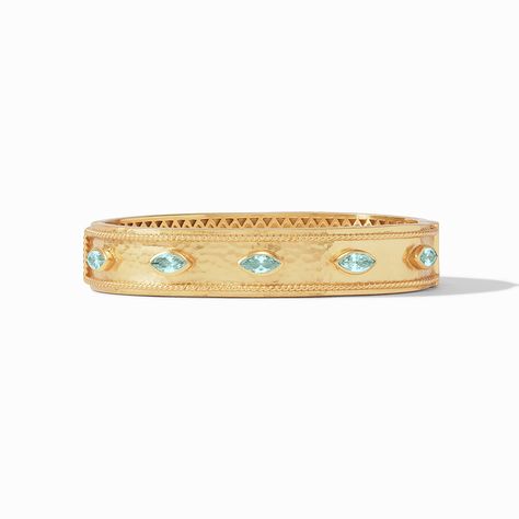 Adorn your wrist with a piece that shimmers and glitters—courtesy of lightly hammered gold and marquise CZs—emanating sheer elegance.