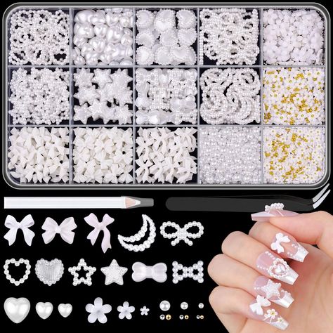 PRICES MAY VARY. 🎀 Great Value Nail Charms Set: The Package contains a 15-grid box of bow nail charms, multi-shape pearl nail charms, 3D nail flowers, and small nail pearls. Besides, this package also comes with a pc of tweezers and a pc of picker pencil for your convenient to pick up the charms. 🎀 Coquette Bow Nail Charms: There are about 90PCS of white nail bows in 3 styles. It is a great amount of nail charm bows to meet your various nail design and decorative needs, making your projects mo Pearl Charms Nails, Nail Charms Aesthetic, Nail Sets With Charms, Charm Nail Designs, Nail Items, Nail Pearls, Nail Flowers, 3d Nail Charms, Coquette Nails