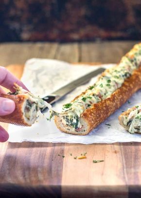 This easy, cheesy, creamy feta and spinach stuffed french bread is deliriously rich and tasty. It reminds me of a Greek spanakopita but all stuffed inside a wonderful sourdough bread loaf. Perfect hand held appetizer for parties or the holidays! www.keviniscooking.com French Bread Appetizers, Sourdough Bread Loaf, Appetizers For Party Easy, Stuffed French Bread, Greek Spanakopita, Creamy Feta, French Bread Recipe, Bread Appetizers, Bread Loaf