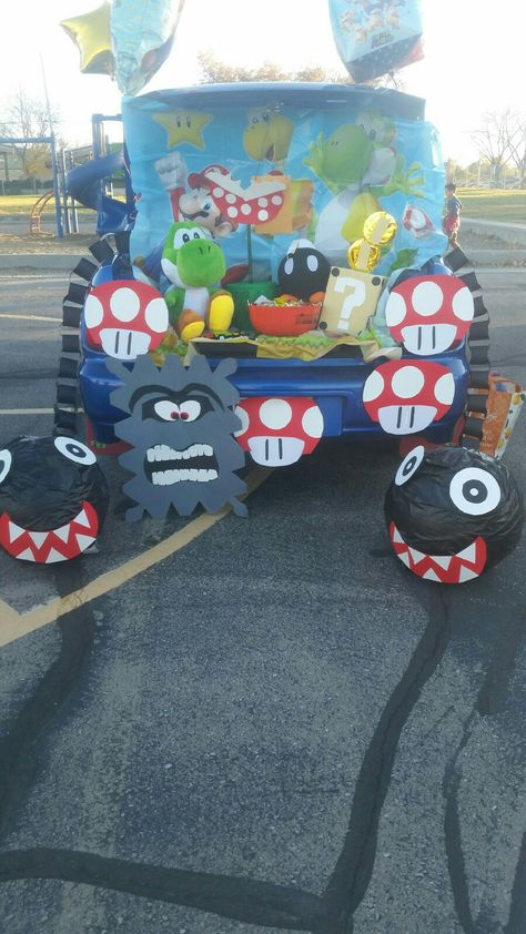 My trunk or treat first time most of the decorations done by hand by me. Super mario trunk or treat. Super Mario Family Costume, Mario Trunk Or Treat, Mario Family Costume, Family Costume Halloween, Mario Halloween Costumes, Golf Cart Decorations, Trunker Treat Ideas, Super Mario Bros Party, Mario Bros Party