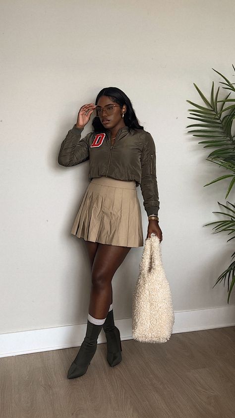 Grab your favorite school-related gear and pair with a skater skirt and some sock boots for the ultimate tailgating outfit! Pinterest Creators hbcu homecoming outfits, hbcu outfits, hbcu fashion • Skirt: Amazon • Boots: Ego • Bag: Target Hbcu Football Game Outfits, Hbcu Homecoming Outfits, Hoco Fits, Hbcu Outfits, Amazon Boots, Hbcu Homecoming, Hbcu Fashion, Hoco 2023, Homecoming 2024