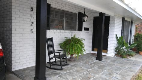 Black Stained Porch Columns, Small Front Porch Post Ideas, Front Porch Wood Pilars, Covering Wrought Iron Porch Columns, Updated Porch Columns, Painted Columns On Front Porch, Black Front Porch Columns, Black Pillars On Front Porch, Black Concrete Porch