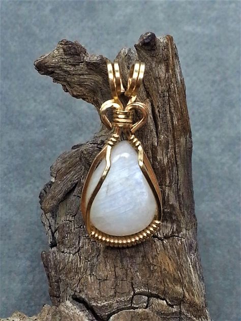 Albite Moonstone Rare Canadian Wire Wrap Pendant, a Peristerite Feldspar hand Polished Canadian Cabochon Wrapped with 14kt Gold Filled wire by PargemDesigns on Etsy Wire Wrapped Gemstones Pendant, Rock Types, Wire Wrap Pendant, Gemstone Cabochons, Wire Weaving, Cabochon Pendant, Moonstone Pendant, Oval Pendant, Wrapped Pendant