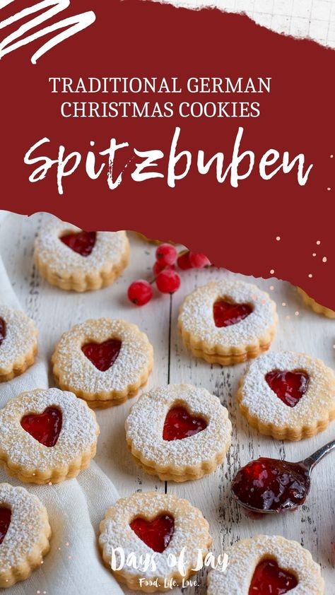 One of the most beautiful traditional German Christmas cookies recipes is Spitzbuben. Also known as Linzer Augen or Linzer Cookies, the delicious combination of buttery short pastry and tangy redcurrant jelly is a Christmas classic. German Linzer Cookies, Beautiful Pastries Recipes, German Sweets Recipes, German Linzer Cookies Recipe, Jelly Christmas Cookies, German Biscuits Recipes, Christmas Cookies German, German Christmas Baking, Lintz Cookies