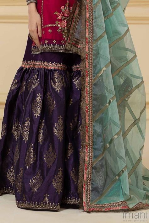 3 Pieces Outfit (Shirt, gharara and Dupatta) Organza Straight shirt intricately embroidered and hand embellished. Paired with Beautiful Purple jamawar Gharara with embroidered patti at knee and Hemline and contrast Light Turquoise colourTie&dye Organza Dupatta with embroidered patti & Fringe on all 4 sides. Purple Gharara, Pink Purple Outfit, Jamawar Gharara, Green Gharara, Pink Gharara, Gharara Designs, Desi Fits, Desi Dress, Purple Outfit