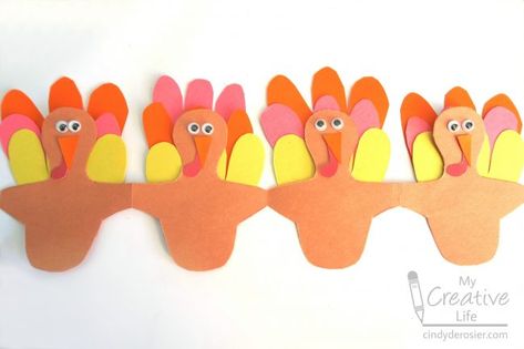 Construction Paper Turkey Chain | Fun Family Crafts Construction Paper Turkey, Crafts For Thanksgiving, Decoration For Thanksgiving, Turkey Theme, Paper Turkey, Recycled Crafts Kids, Thanksgiving Paper, Paper Chain, Edible Crafts