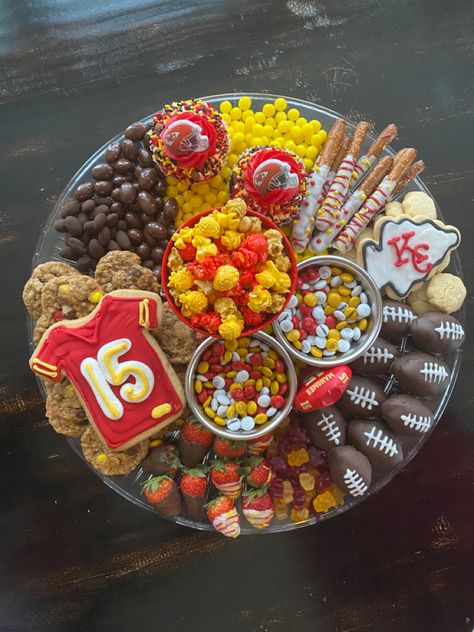 An assortment of sweet treats in team colors! Race Car Charcuterie Board, Chiefs Charcuterie Board, Charcuterie Dessert Board, Football Charcuterie, Football Party Treats, Charcuterie Dessert, Football Night, Superbowl Desserts, Board Night