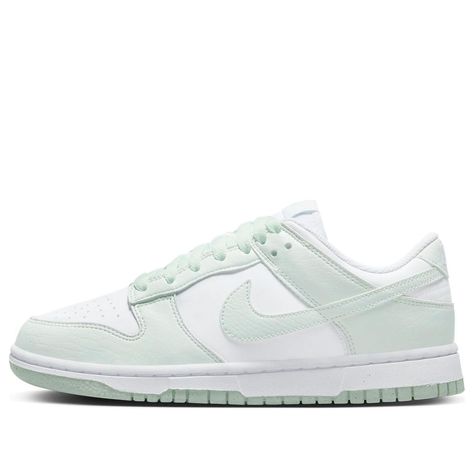 The Nike WMNS Dunk Low Next Nature 'White Mint' offers a modern twist on a classic silhouette. The model is composed of 50% recycled materials, ensuring a more sustainable way to wear your favourite Dunks. The upper combines a powerful palette of white and Mint shades, forming an unforgettable two-tone design that honours some of Nike’s thinnest classic models. Finished with matching soles and woven tongue labels, this shoe is perfect for those looking to make a statement while respecting the environment. Experience the class and sustainability of the enduring Dunk proof in the Nike WMNS Dunk Low Next Nature 'White Mint'. Nike Dunk Low Next Nature, Mint Shoes, Dunk Lows, Boty Nike, Sneaker Trend, Preppy Shoes, Nike Models, Baskets Nike, Cute Nike Shoes