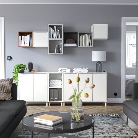 EKET Storage combination with legs, White/light gray dark gray/walnut effect, 82 5/8x13 3/4x82 5/8 ". With the EKET series you can build your storage big, small, colorful or discreet to either display or hide your things. And if your space and needs change, you can easily change your EKET solution too. Back panel: Fiberboard. Hallway Seating, Ikea Eket, Movable Shelf, Ikea Besta, Painted Drawers, Grey Furniture, Craft Room Storage, Ikea Furniture, Cube Storage