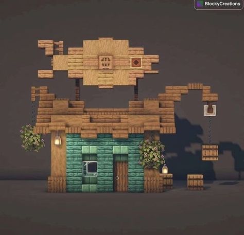 ▛From IG: blockycreations▟ Quirky and intricately designed fisherman's house. It also looks like fishing store! I can imagine this sitting on a pier overlooking a lake or the sea. Check out the 3 other variations of the Fisherman's House by visiting the link! Multiplayer Minecraft Ideas, Cool Survival Minecraft Builds, Minecraft Easter Island Head, 3x3 Spiral Staircase Minecraft, Minecraft Village Shop Ideas, Minecraft Centre Piece, Minecraft Suburbs House, Minecraft Bait Shop, Cute Jungle Wood House Minecraft