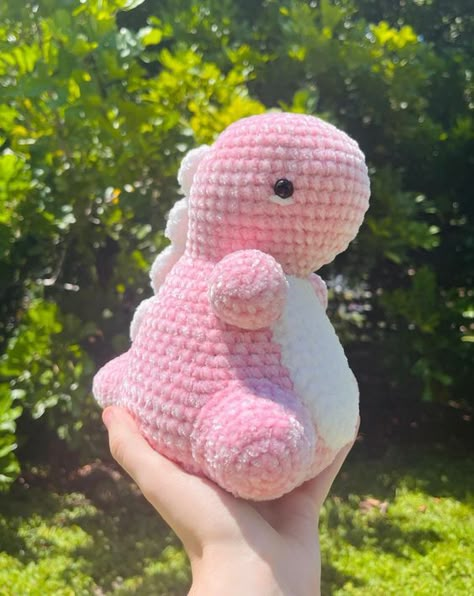 Crochet stuffed animals Unique Crochet Stuffed Animals, Crochet Pink Dinosaur, Crochet Strawberry Dinosaur, Crochet Pink Animal, Crochet Pink Plushies, Chubby Dino Crochet Pattern Free, Pink Crochet Animals, Chubby Dino Crochet Pattern, Simple Crochet Plushies