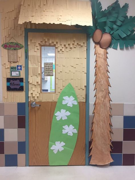 To match our "Around the World" theme, my classroom door was inspired by tiki-huts, surf shops, and the beach! The overhead structure was made from cardboard and covered with strips of manila paper! Tropical School Theme, Hawaii Classroom Decorations, Hawaiian Theme Summer Camp, Classroom Door Beach Theme, Beach Theme Classroom Bulletin Boards, Island Themed Classroom, Beach Decorations For Classroom, Hawaii Hallway Decorations, Luau Door Decorations