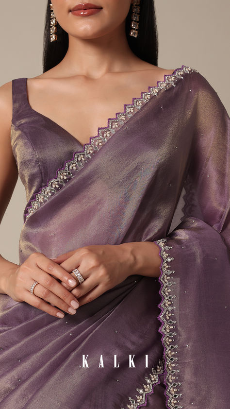 Indulge in the allure of this Orchid Glass Crush Saree. The mirror and stone embellishments on the scallop border create a rich tapestry of craftsmanship. The vibrant purple and lavender hues elevate the softness of the fabric, making it a statement piece for celebratory occasions. With detailed precision and an included unstitched blouse fabric, this saree assures a tailored fit. Saree With Mirror Work, Crush Saree, Mirror Work Border, Simple Saree Designs, Bridesmaid Saree, New Saree Blouse Designs, Lehenga Designs Simple, Purple Saree, Latest Model Blouse Designs