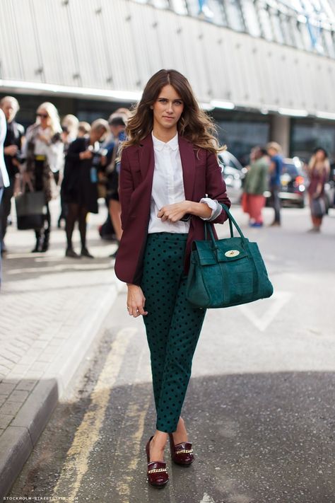 To create an outfit for lunch with friends at the weekend opt for a burgundy blazer and teal polka dot skinny pants. Why not add oxblood leather wedge pumps to the mix for a more relaxed feel?  Shop this look for $248:  http://lookastic.com/women/looks/wedge-pumps-skinny-pants-satchel-bag-blazer-dress-shirt/4324  — Burgundy Leather Wedge Pumps  — Teal Polka Dot Skinny Pants  — Teal Leather Satchel Bag  — Burgundy Blazer  — White Dress Shirt Dark Green Pants Outfit Women, Dark Green Pants Outfit Work, Dark Green Outfit Color Combos, Green And Burgundy Outfit, Dark Green Pants Outfit, Burgundy Blazer Outfit, Dark Green Pants, Teal Pants, 2022 Outfits