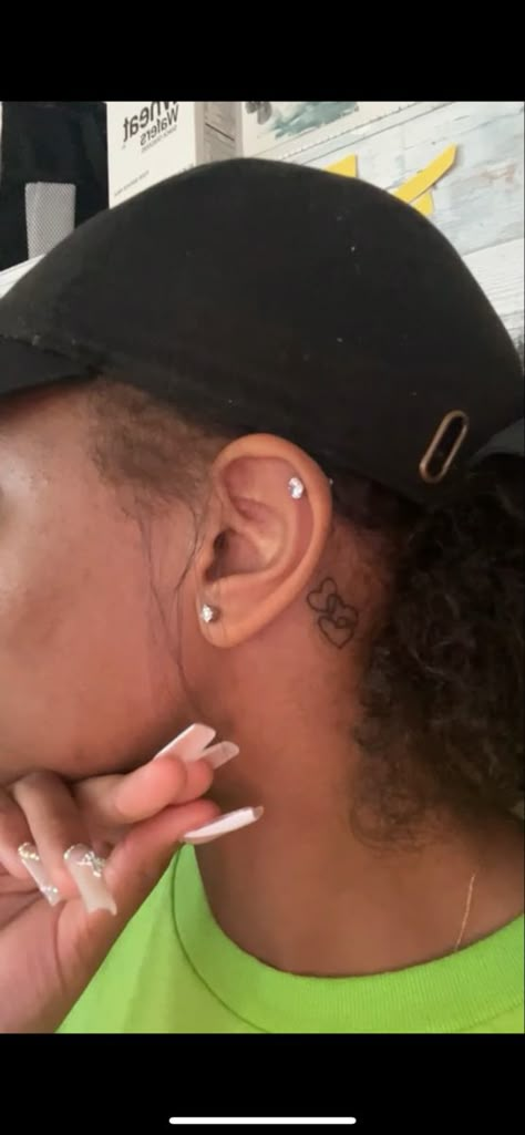 heart tattoo behind the ear Hello Kitty Behind The Ear Tattoo, Hearts Behind The Ear Tattoo, Matching Tattoos Behind Ear, Heart Tattoo Ear, Heart Ear Tattoo, Behind The Ear Tattoo Ideas Small, Heart Behind Ear Tattoo, Heart Behind Ear, Simple Ear Piercing Ideas