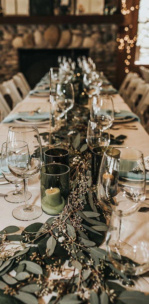 The reception tables were a beautiful contrast to the white outside. There were leaves and baby’s breath galore! There were even dark green candle holders to create and earthy glow. | A Winter Wonderland Wedding | Kate Aspen #weddingaesthetic Place Settings, The Table, Wine, Green