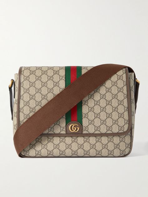 It was while working at the Savoy Hotel that Guccio Gucci got his idea for a line of travel-centric leather goods. A century on, Gucci's bags are just as desirable. The medium-sized 'Ophidia' messenger is ideal for trips into the office. It's made from the label's 'GG Supreme' coated-canvas, with signature webbing and an adjustable shoulder strap. Gucci Bag Men, Messenger Bag For Men, Gucci Collection, Savoy Hotel, Gucci Purse, Gucci Ophidia, Guccio Gucci, Man Purse, Canvas Messenger Bag