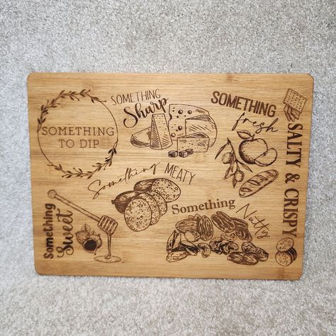 Personalized Engraved Wooden Charcuterie Board

Elevate your gatherings with this handcrafted charcuterie board.  Laser-engraved for a unique touch, it's perfect for cheese, meats & snacks.  Rich brown wood, hand-wash only.

#charcuterieboard #wood #personalized #gift #engraved #homedecor #entertaining #party #foodie #handmade Cnc Charcuterie Board, Wood Burned Cheese Board, Personalized Laser Engraved Gifts, Wood Burn Keychain Ideas, Charcuterie Board Design Ideas Wood, Things To Make And Sell With Laser Engraver, Laser Engraved Charcuterie Board, Personalized Charcuterie Board Ideas, Wood Engraving Art