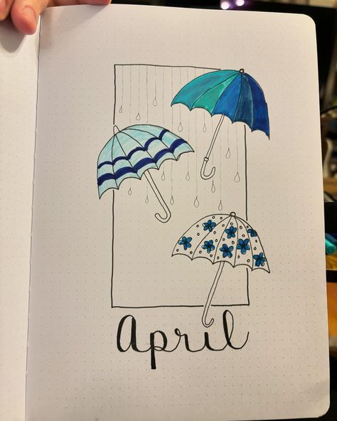 ☔️ Embrace the showers of April with my fun bullet journal cover! ☔️ This month’s theme is all about celebrating the beauty and joy that rain can bring. I’ve adorned my cover with an array of fun umbrellas. 🌈✨ From cozy reading days to spontaneous adventures, this cover inspires me to stay organized, creative, and grateful for the ever-changing seasons. 🌧️🌿 #BulletJournal #AprilCover #BulletJournaling #BulletJournalSetup #AprilShowers #RainyDay #ColorMyLife #creativeJournal #SpringVibes #J... Umbrella Bullet Journal, Rain Bullet Journal, Bullet Journal April Cover, Fun Umbrellas, April Bullet Journal Cover, April Journal, Bullet Journal April, Spontaneous Adventures, April Rain